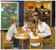Family at play in Ellettsville Children&apos;s Room